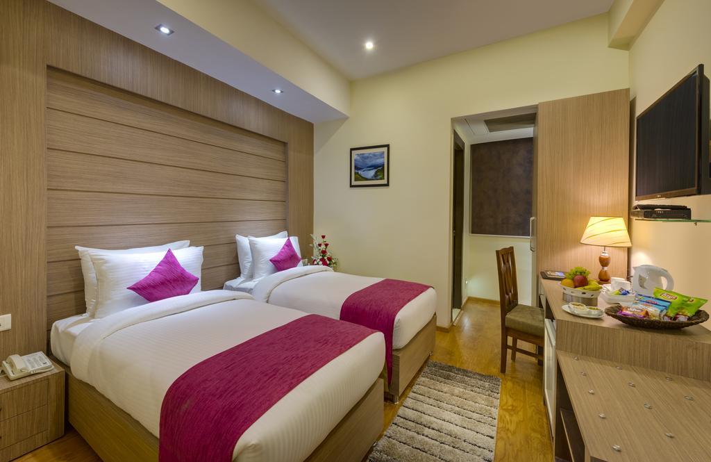 Cygnett Inn Repose Guwahati Bilik gambar